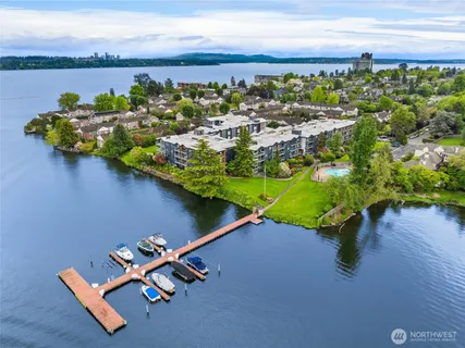 view of a lake with a table and chairs