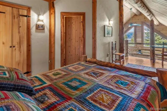 a bathroom with a toilet a sink and shower