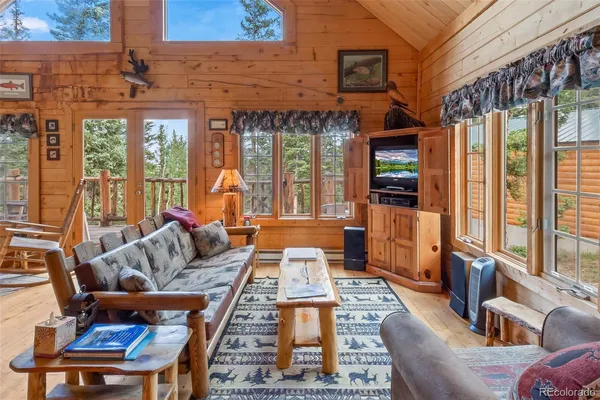 a large living room with large windows