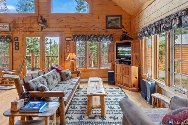 a large living room with large windows