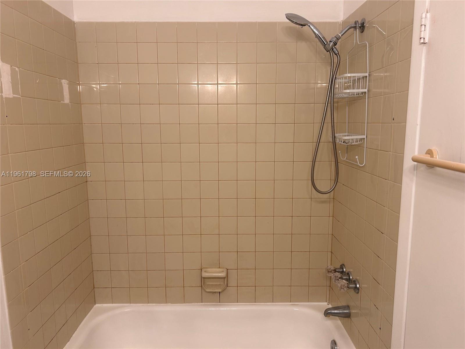 7450 Northwest 34th Street Lauderhill, FL 33351 - Photo 23 of 25 a bathroom with a shower