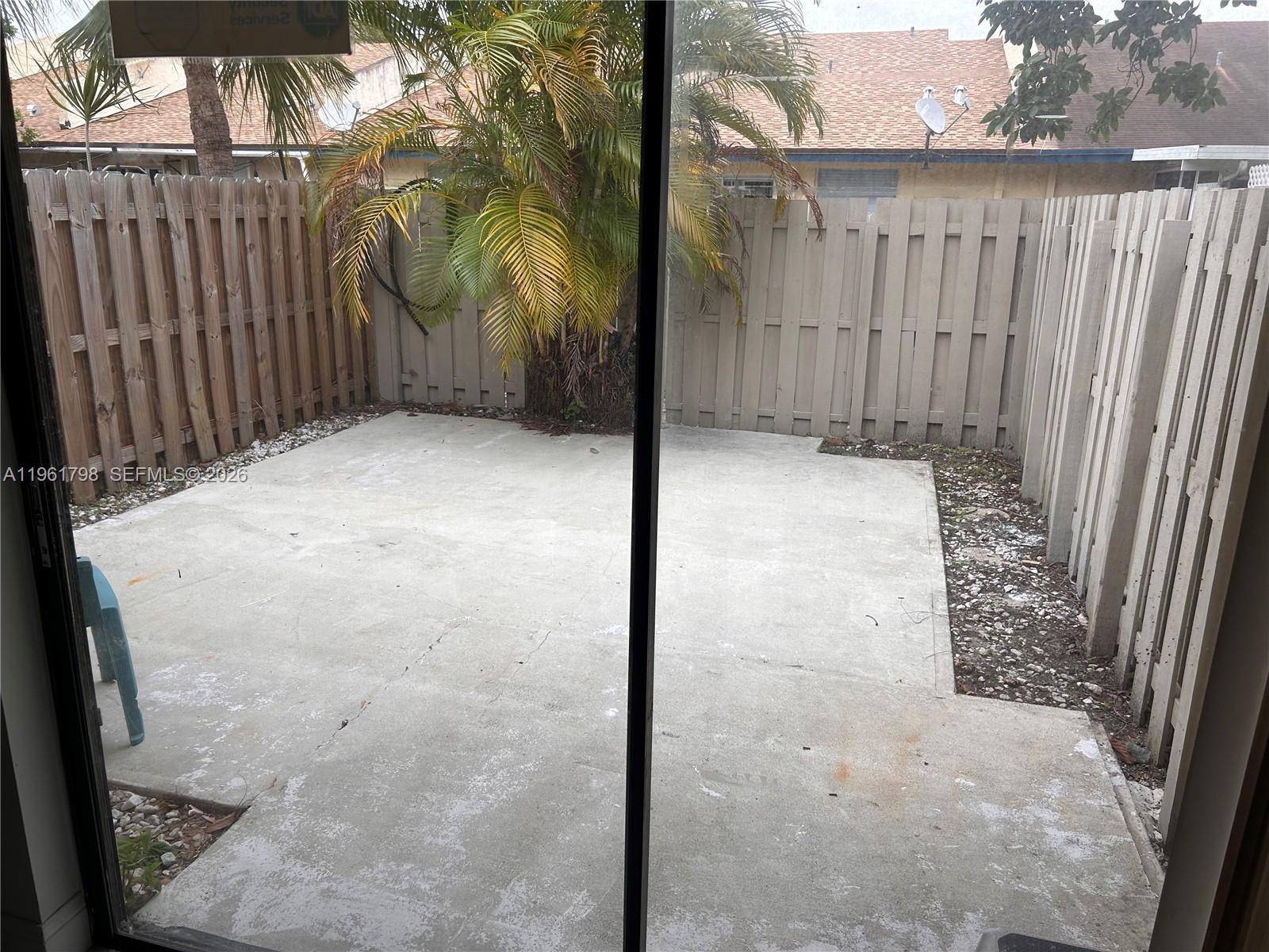 7450 Northwest 34th Street Lauderhill, FL 33351 - Photo 8 of 25 a view of a backyard