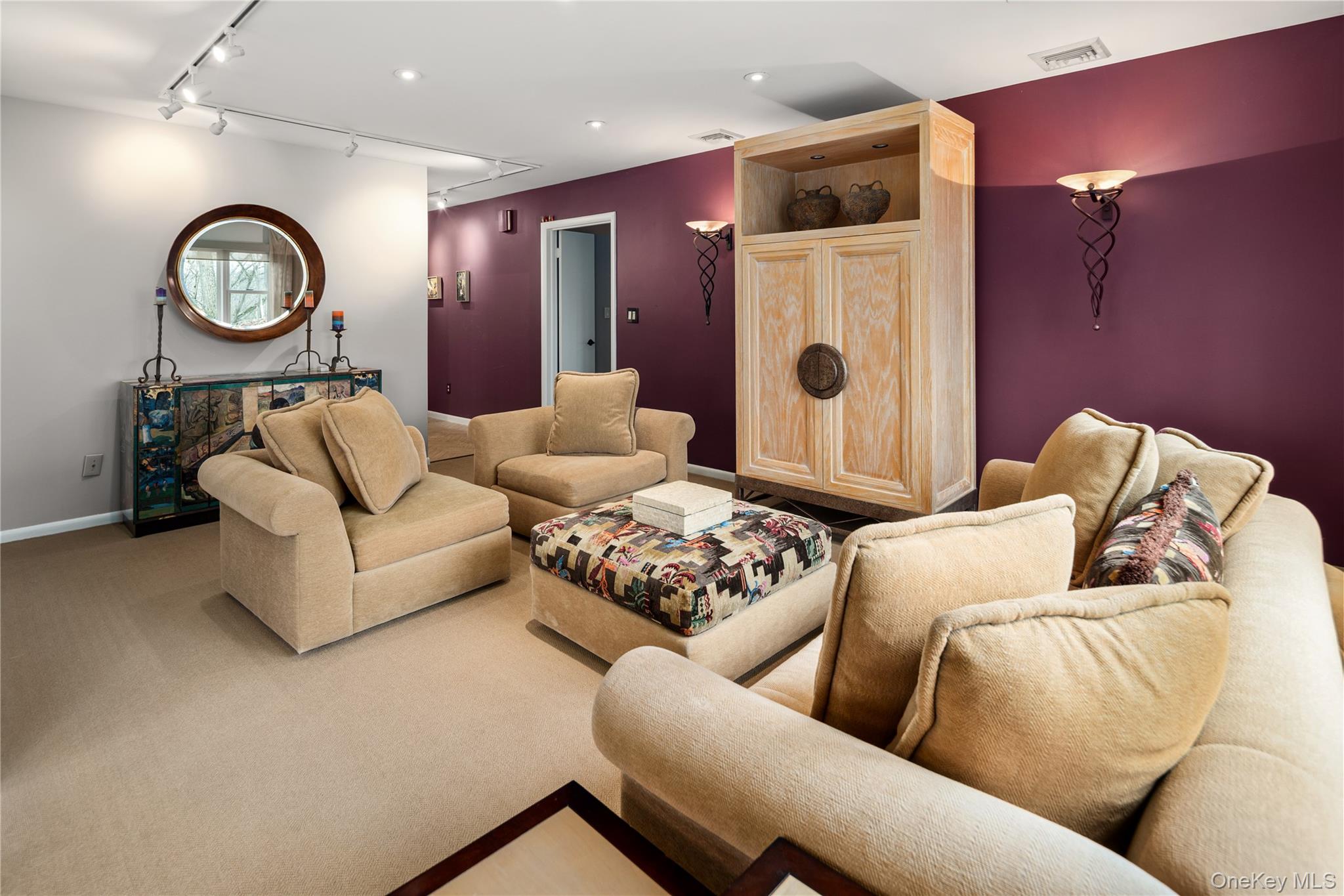 39 Mayberry Road Chappaqua, NY 10514 - Photo 12 of 44 a living room with furniture and a clock