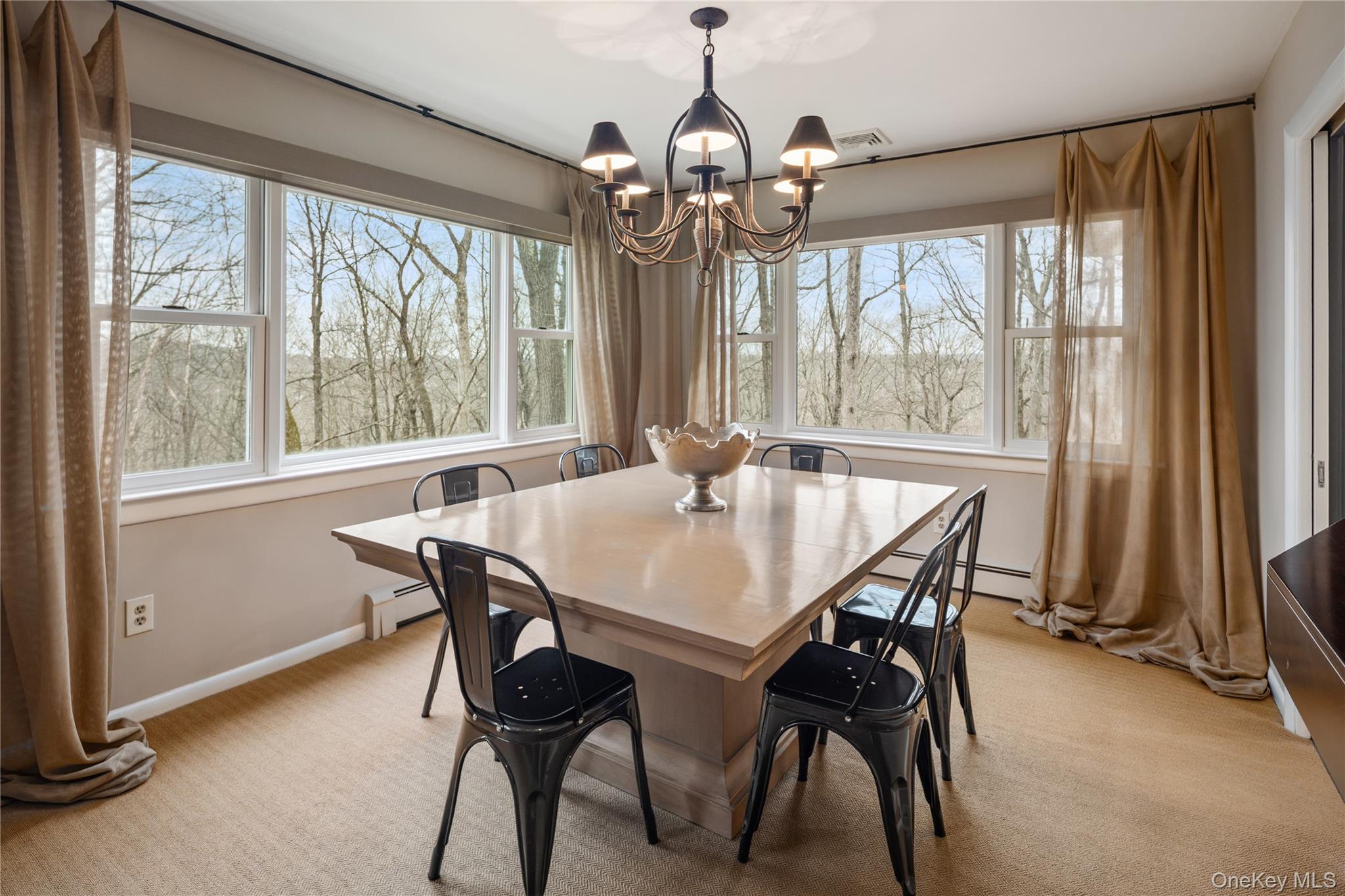 39 Mayberry Road Chappaqua, NY 10514 - Photo 15 of 44 a view of a dining room with furniture window and outside view