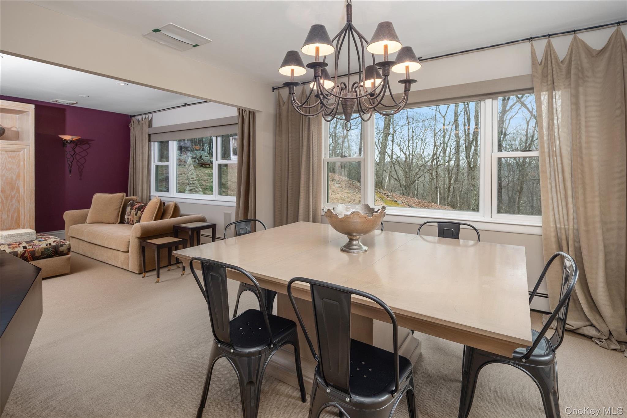 39 Mayberry Road Chappaqua, NY 10514 - Photo 16 of 44 a view of a dining room with furniture a chandelier and large window