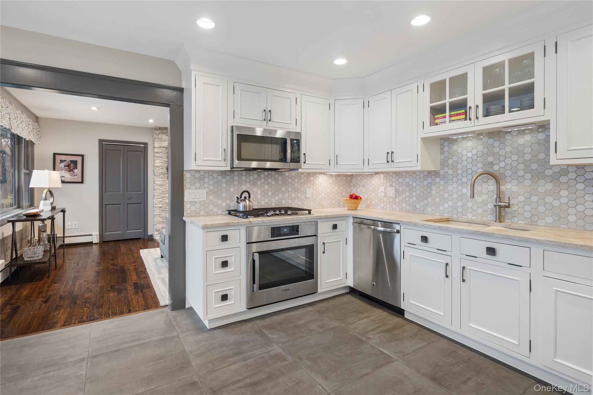 39 Mayberry Road Chappaqua, NY 10514 - Photo 18 of 44 a kitchen with stainless steel appliances granite countertop a sink and cabinets