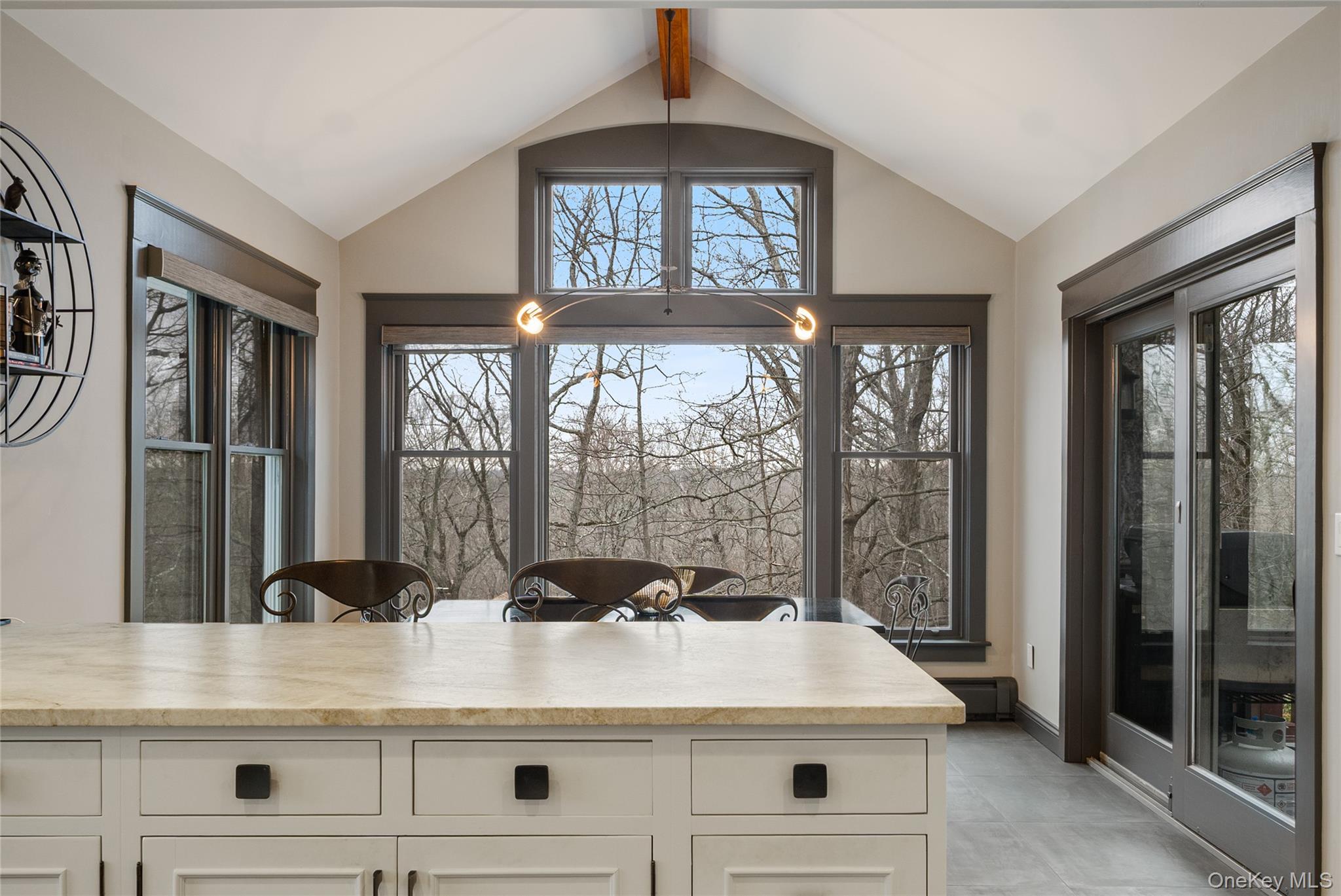 39 Mayberry Road Chappaqua, NY 10514 - Photo 19 of 44 a view of a granite countertop kitchen with a large window