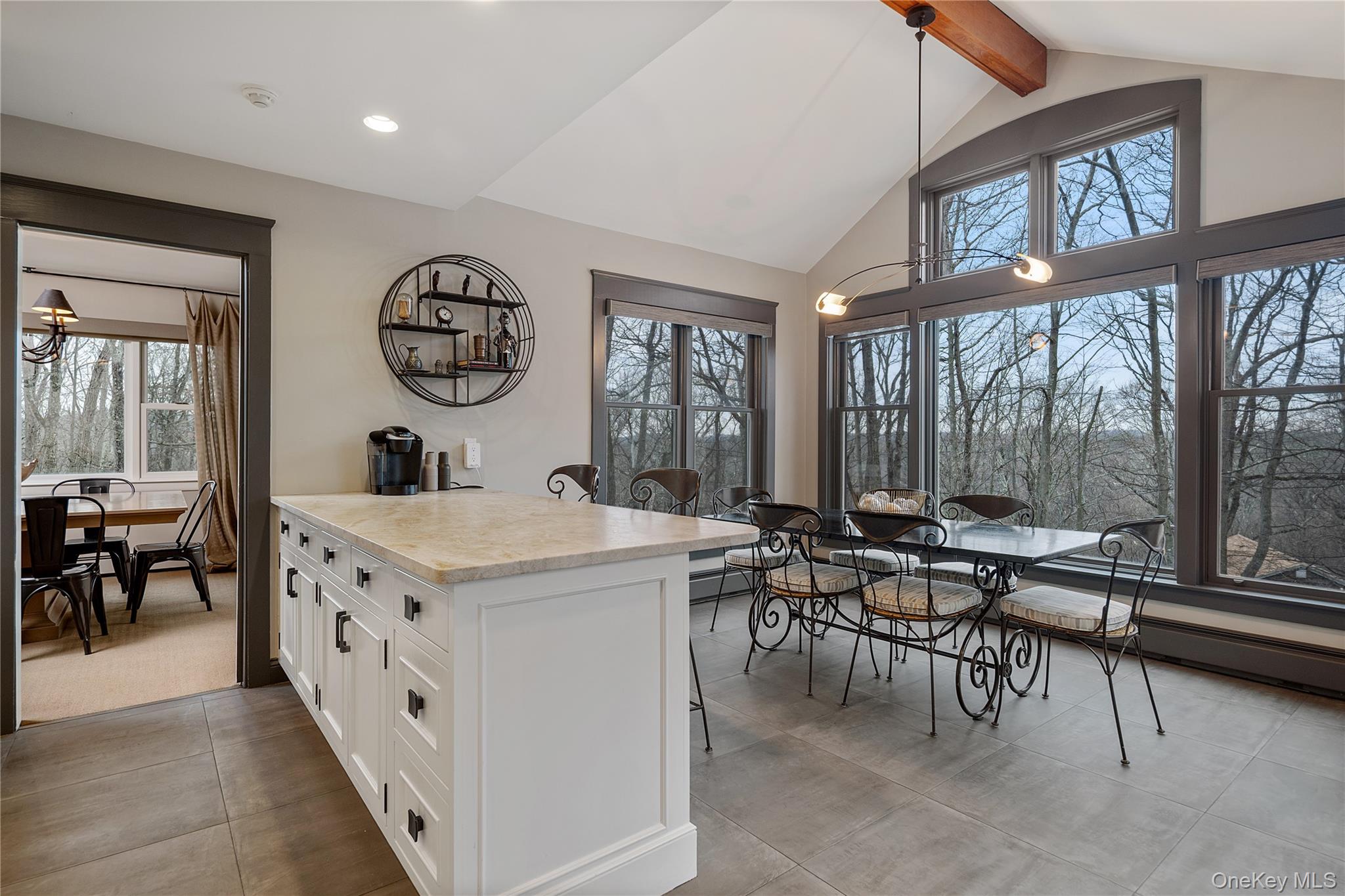 39 Mayberry Road Chappaqua, NY 10514 - Photo 20 of 44 an open kitchen with a table and chairs