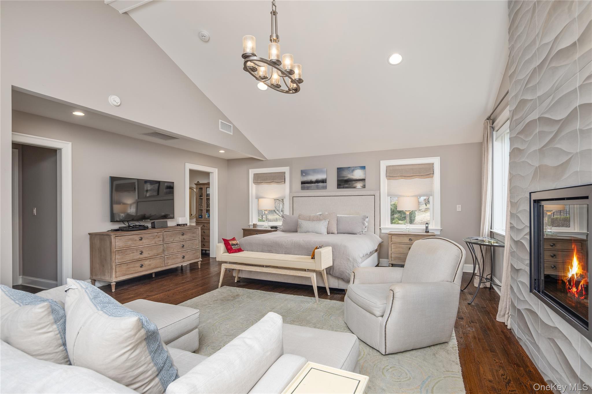 39 Mayberry Road Chappaqua, NY 10514 - Photo 27 of 44 a bedroom with furniture and a flat screen tv