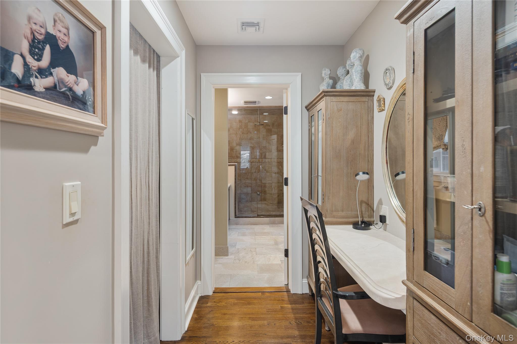 39 Mayberry Road Chappaqua, NY 10514 - Photo 28 of 44 a bathroom with a glass shower door and a mirror