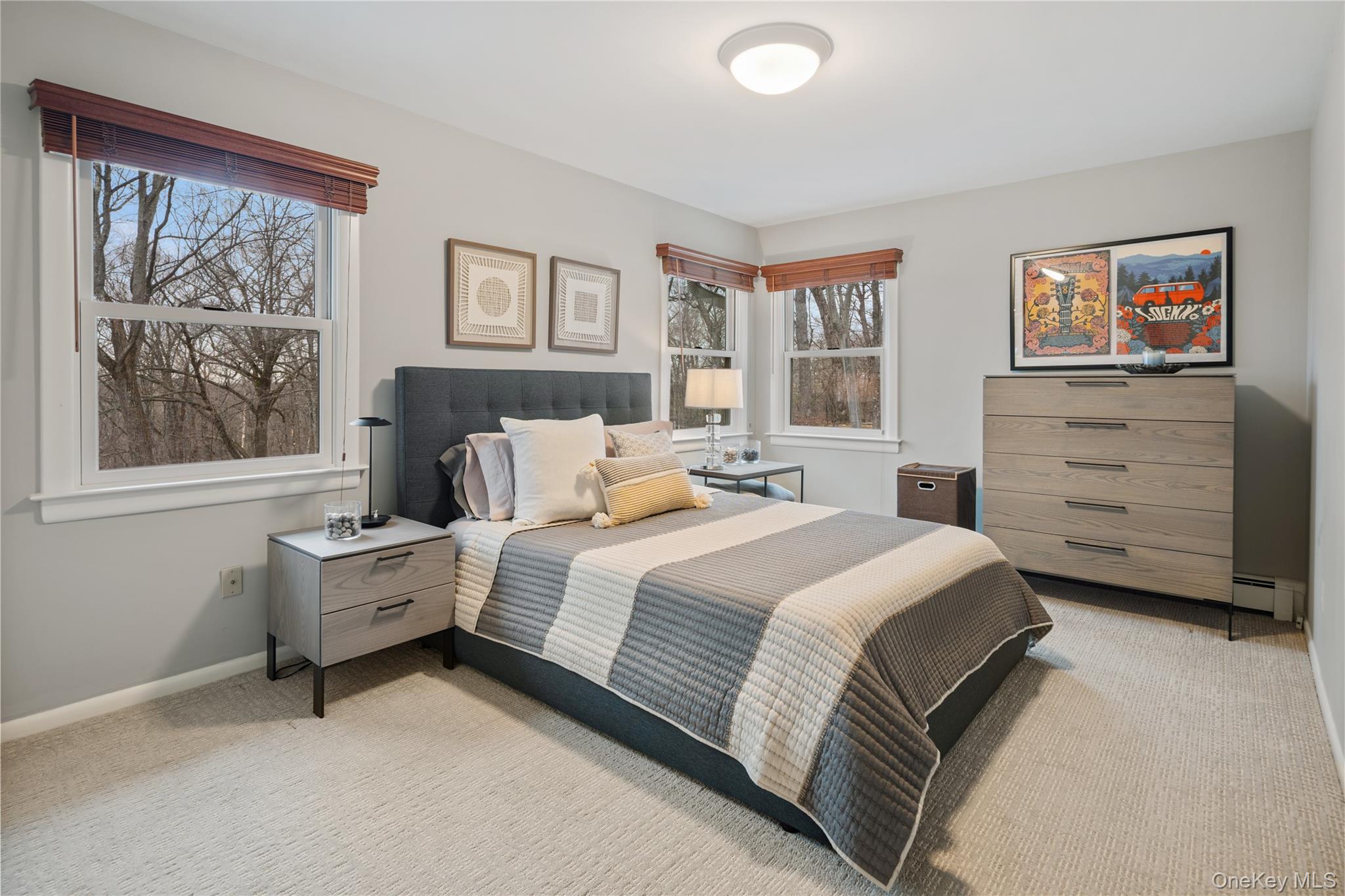 39 Mayberry Road Chappaqua, NY 10514 - Photo 33 of 44 a bedroom with a bed and wooden floor