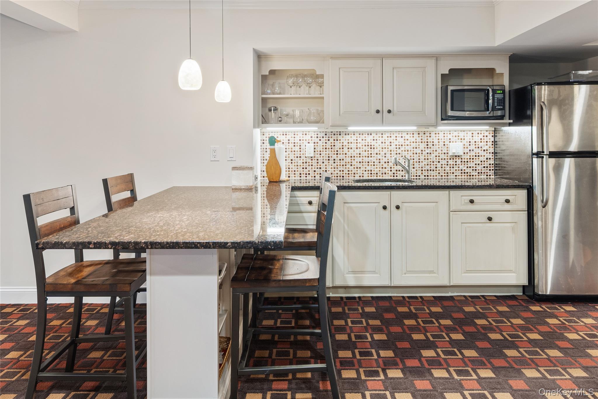 39 Mayberry Road Chappaqua, NY 10514 - Photo 38 of 44 a kitchen with granite countertop a sink and cabinets