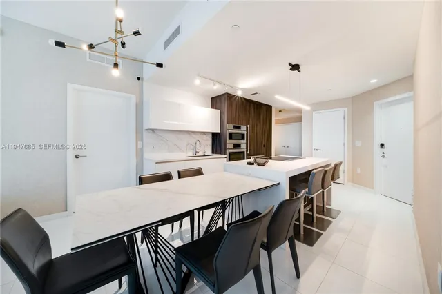 a view of a dining room with furniture