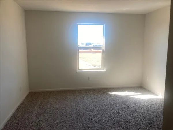 an empty room with a window