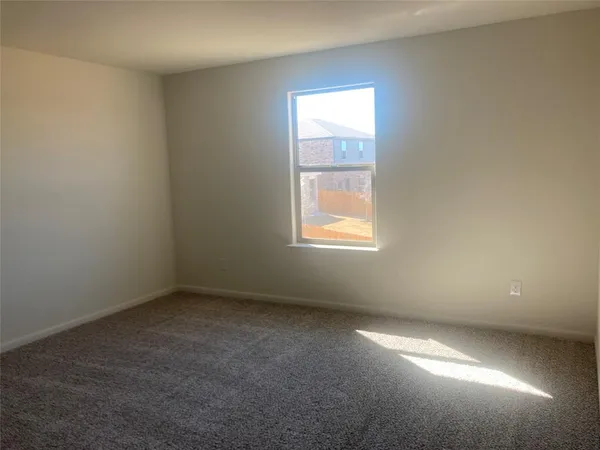 a house view with lake in front of it