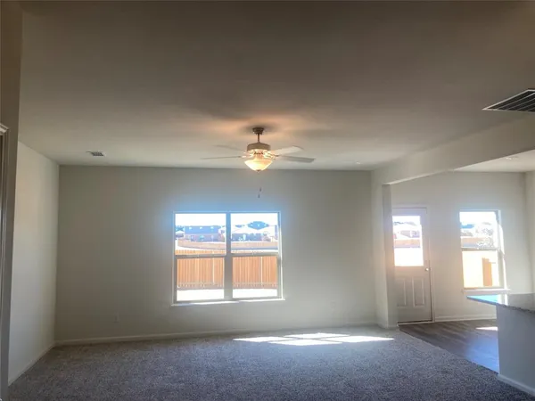 a kitchen with a sink cabinets and stainless steel appliances