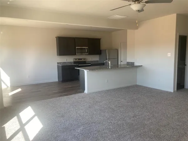 a view of a livingroom with a sink