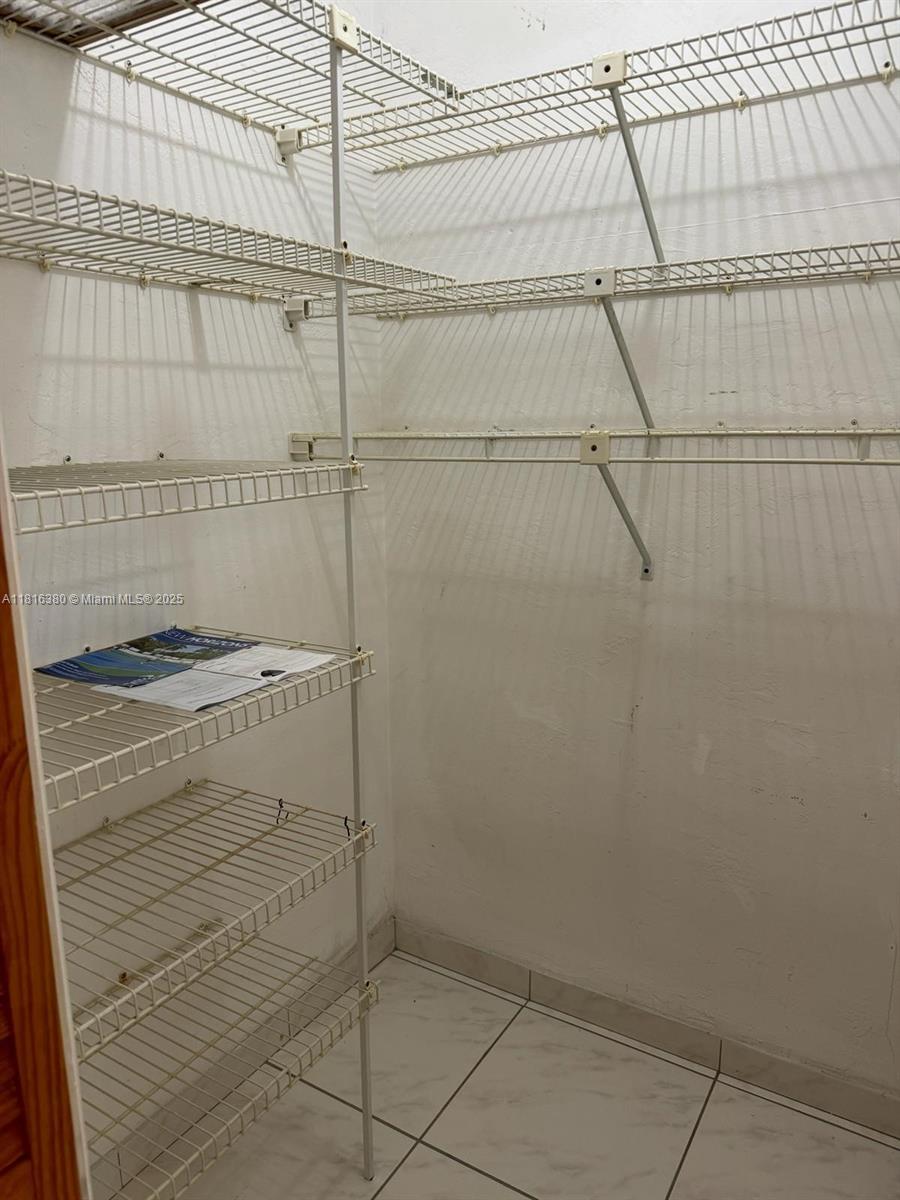 1747 Rodman Street, Unit 203 Hollywood, FL 33020 - Photo 5 of 16 a bathroom with a shower