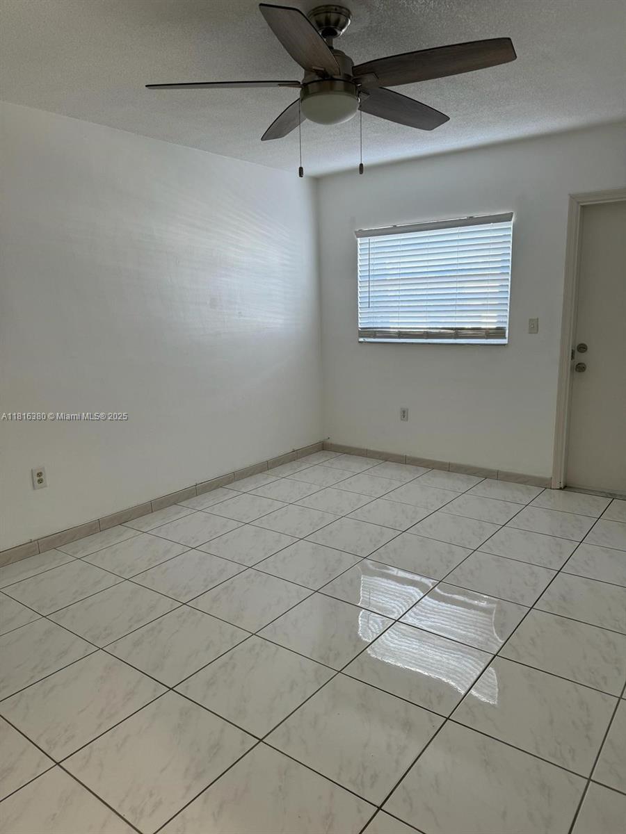 1747 Rodman Street, Unit 203 Hollywood, FL 33020 - Photo 8 of 16 a view of an empty room
