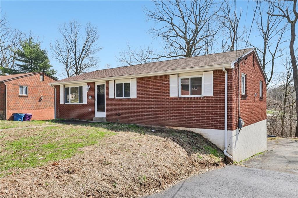 826 Blue Ridge Road Pittsburgh, PA 15239 - Photo 2 of 26 a view of backyard of house