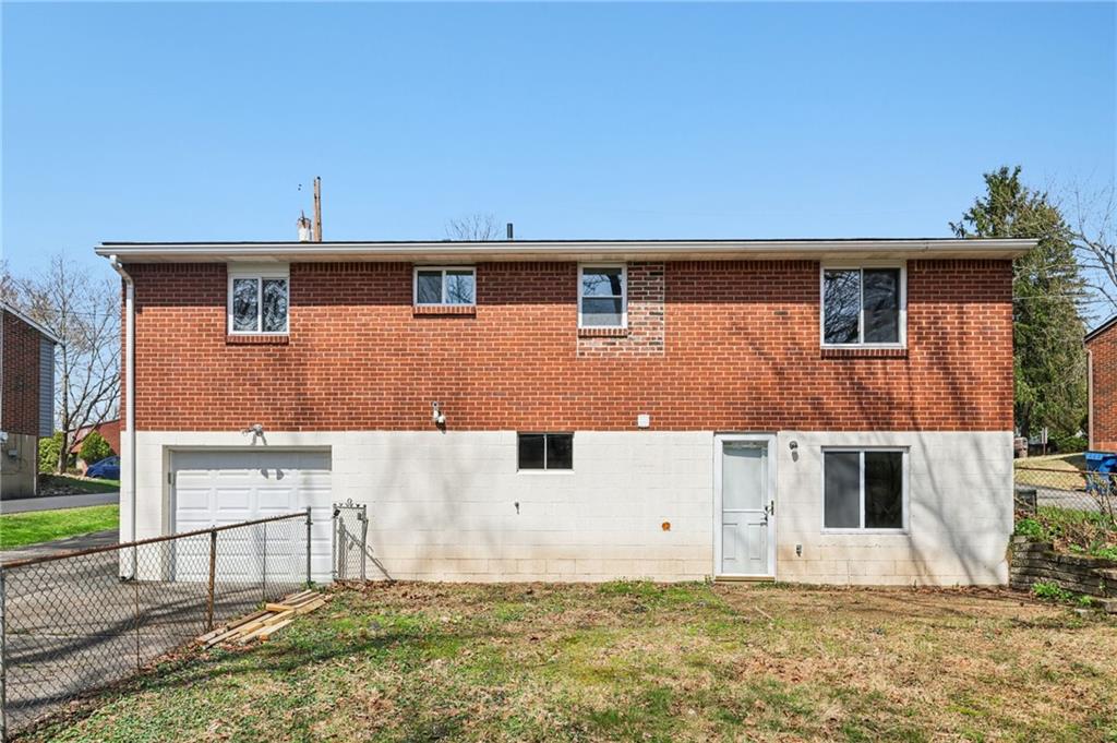 826 Blue Ridge Road Pittsburgh, PA 15239 - Photo 26 of 26 a front view of a house with a yard