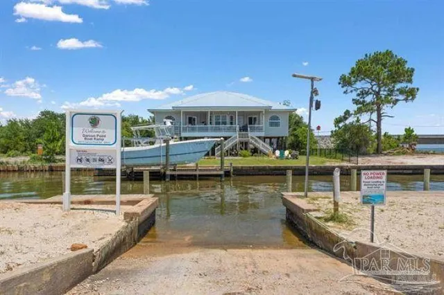 a view of a house with a lake view