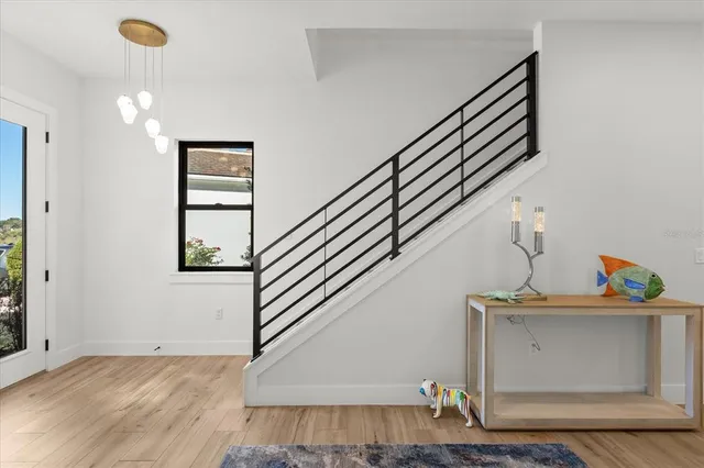 a living room with fireplace furniture and a flat screen tv