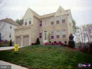 a front view of house with yard