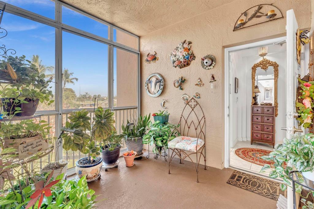 7715 Southampton Terrace, Unit 301 Tamarac, FL 33321 - Photo 3 of 76 a room with furniture and a potted plant