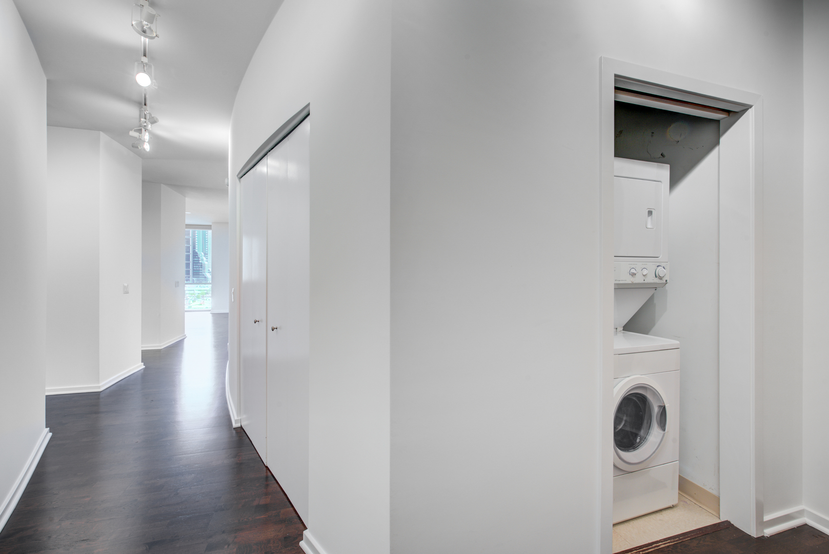 123 South Green Street, Unit 803B Chicago, IL 60607 - Photo 14 of 32 a view of a hallway with wooden floor