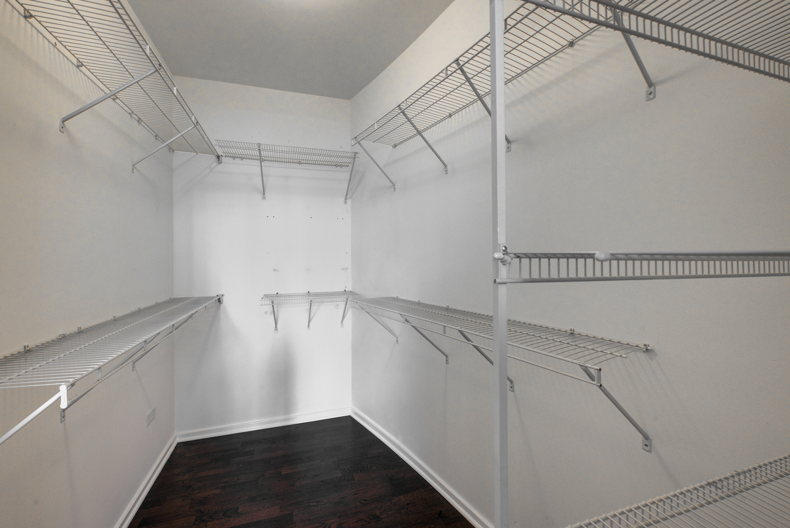 123 South Green Street, Unit 803B Chicago, IL 60607 - Photo 18 of 32 a view of a room with racks on the wall
