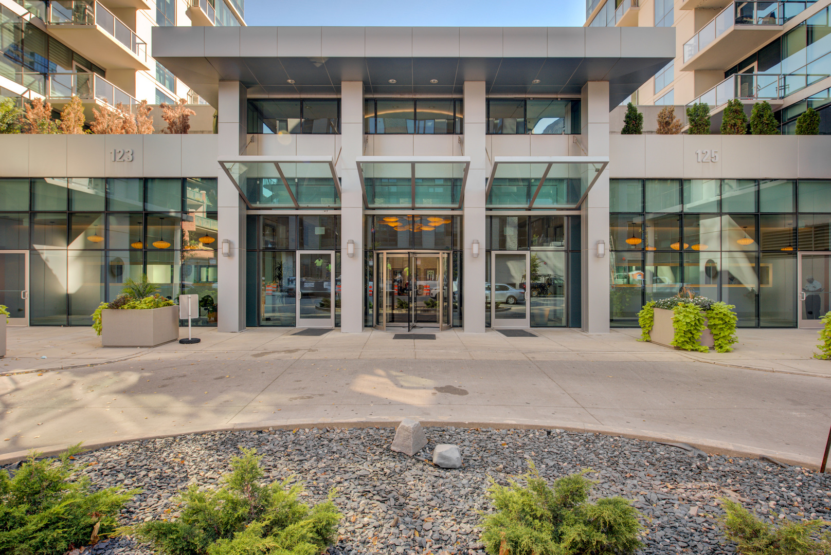 123 South Green Street, Unit 803B Chicago, IL 60607 - Photo 30 of 32 a view of a brick building next to a yard