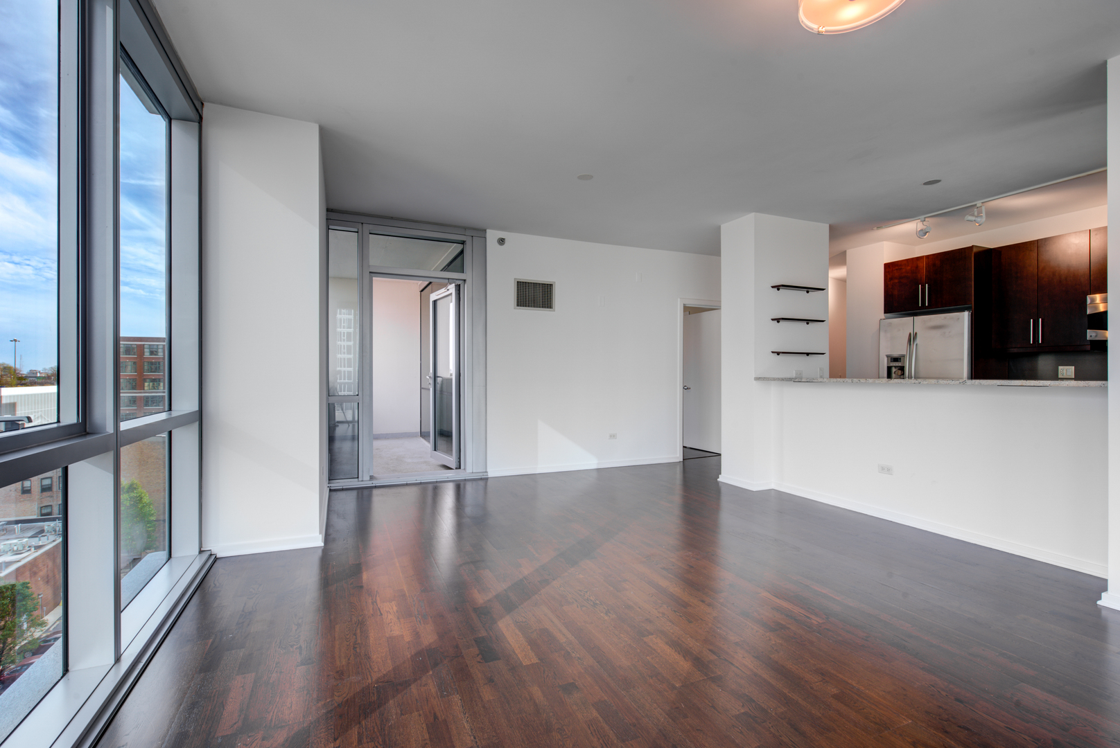 123 South Green Street, Unit 803B Chicago, IL 60607 - Photo 6 of 32 a view of a livingroom with wooden floor