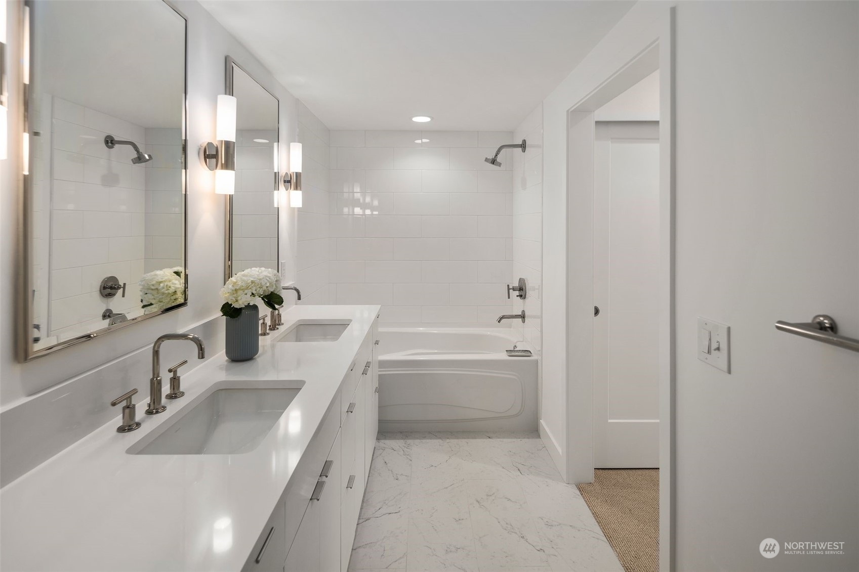 4635 Morris Avenue South, Unit A Renton, WA 98055 - Photo 25 of 38 a bathroom with a tub sink and mirror