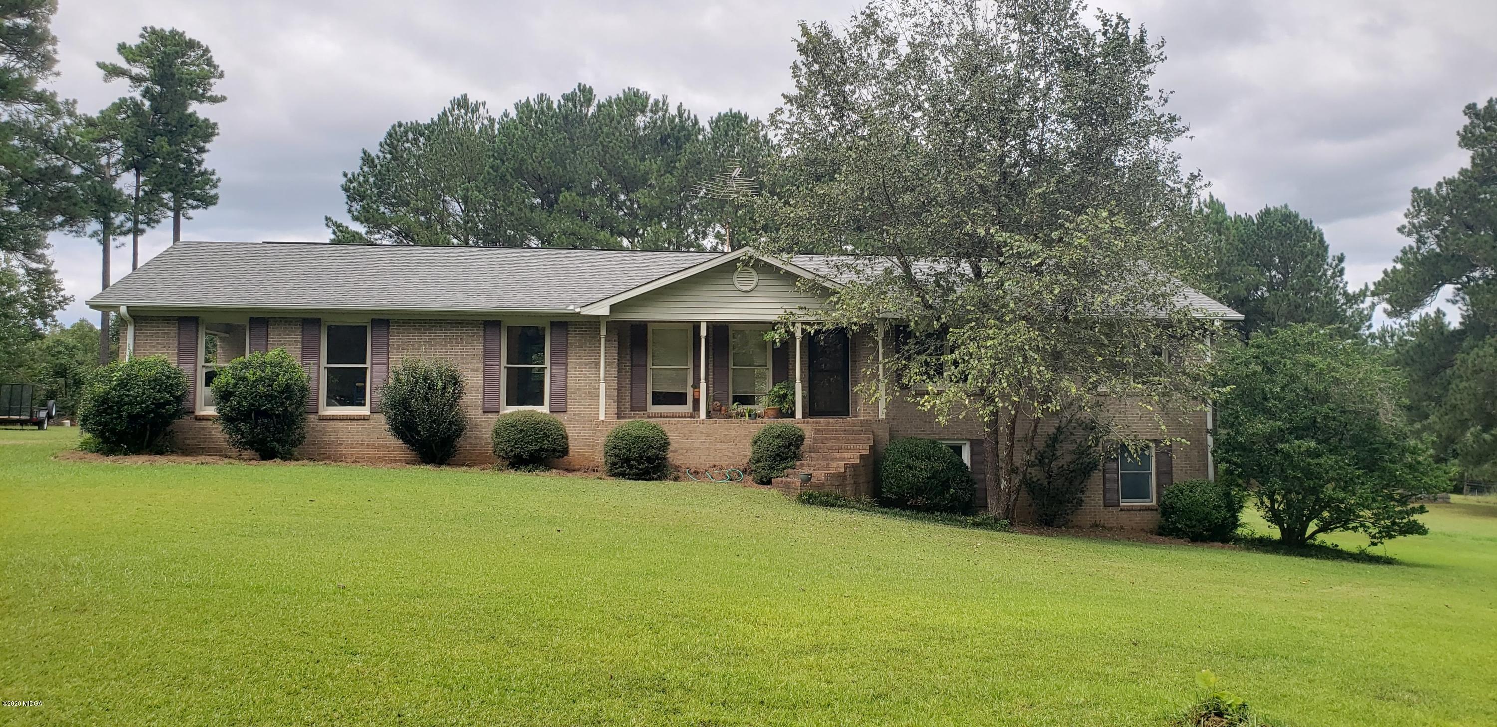 291 Morton Road Gray, GA 31032 - Photo 2 of 33 a front view of a house with yard and green space