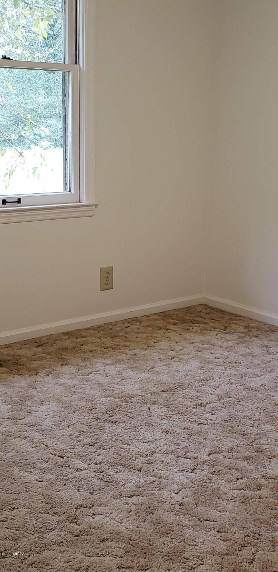 291 Morton Road Gray, GA 31032 - Photo 15 of 33 a view of empty room with window