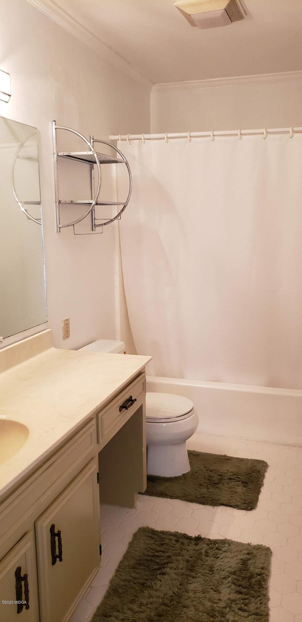 291 Morton Road Gray, GA 31032 - Photo 20 of 33 a bathroom with a sink and a toilet