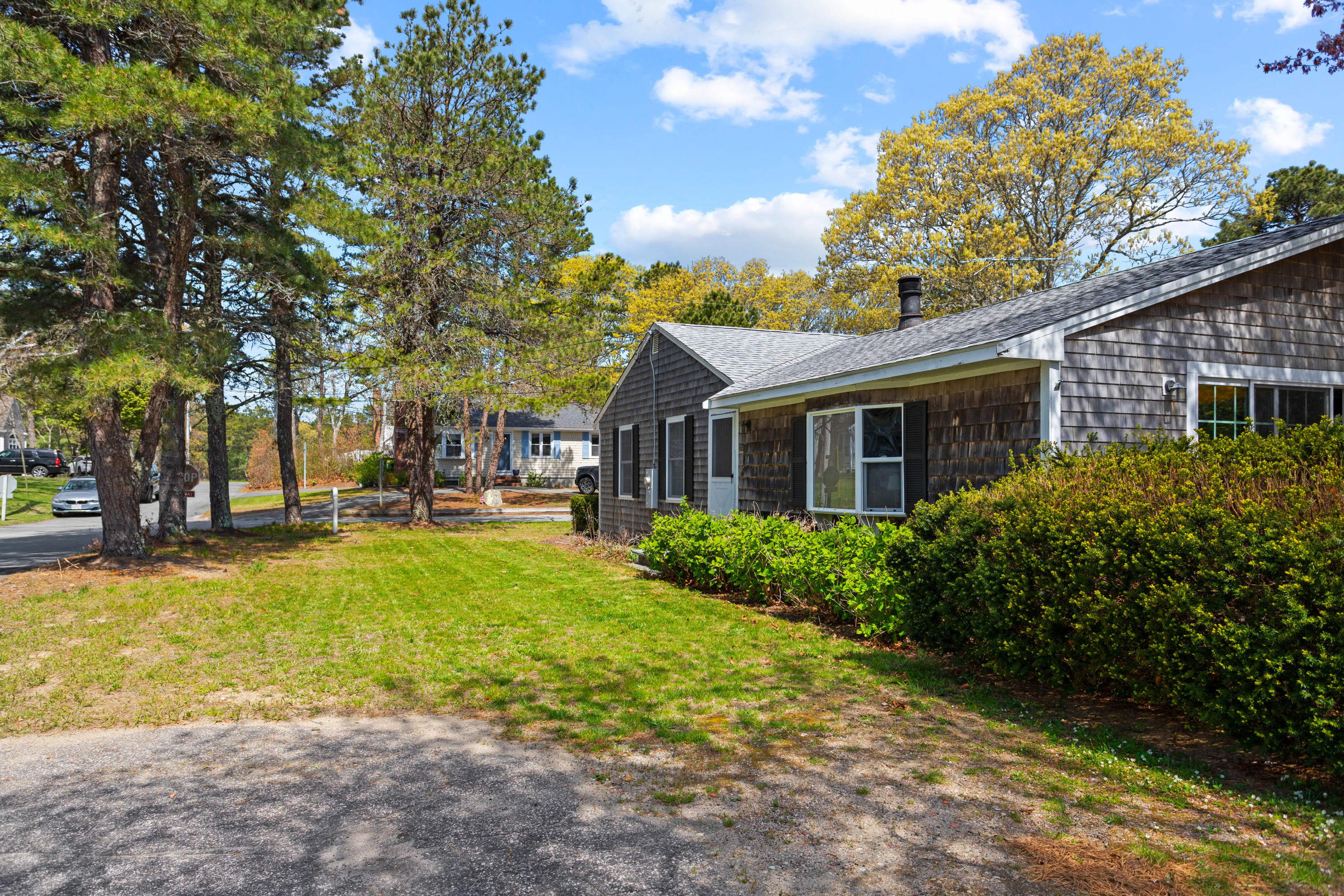 14 Greenwood Road Mashpee, MA 02649 - Photo 11 of 25 a view of a house with swimming pool and sitting area