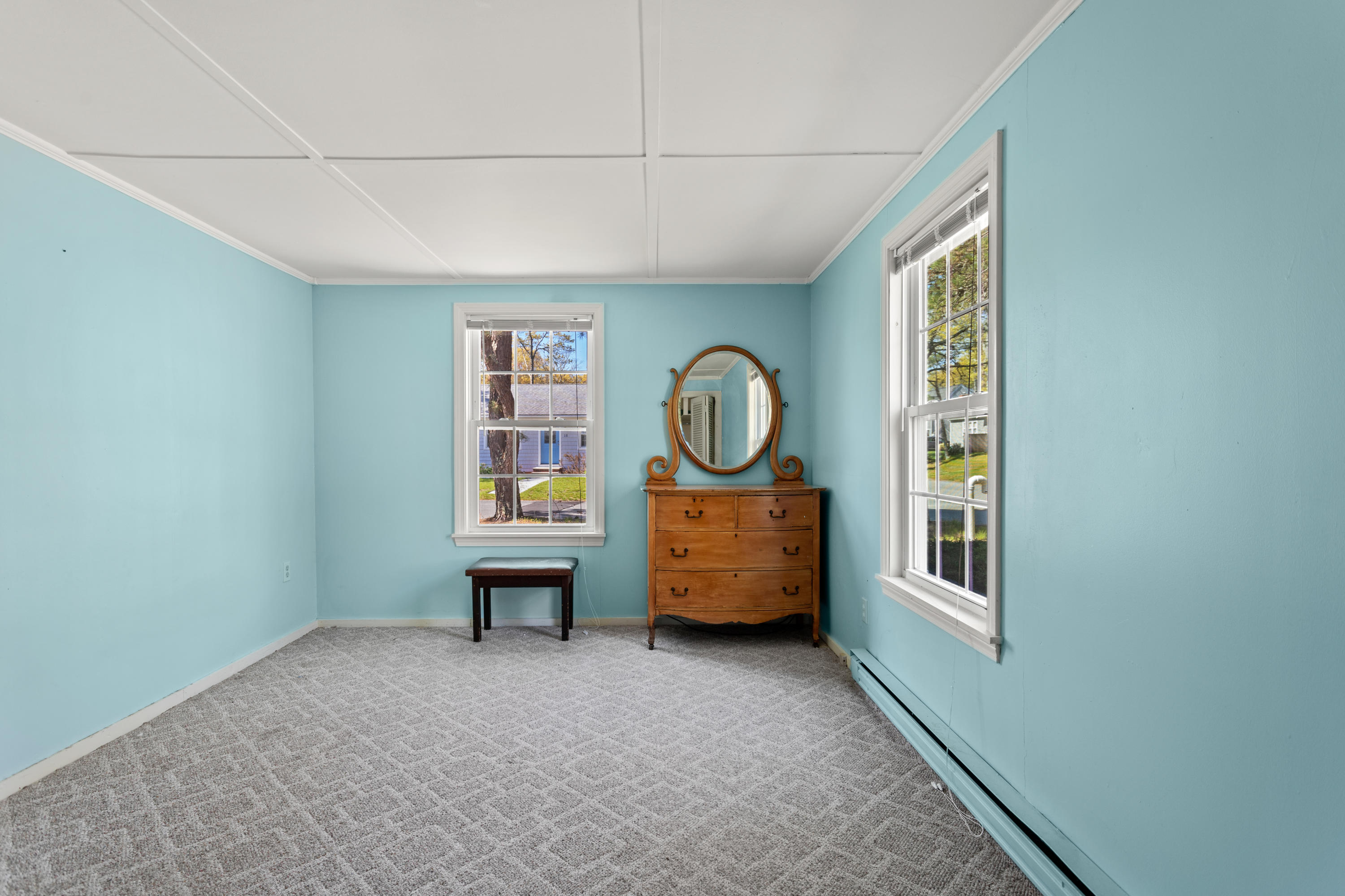 14 Greenwood Road Mashpee, MA 02649 - Photo 14 of 25 a view of a livingroom with furniture cabinet mirror and windows