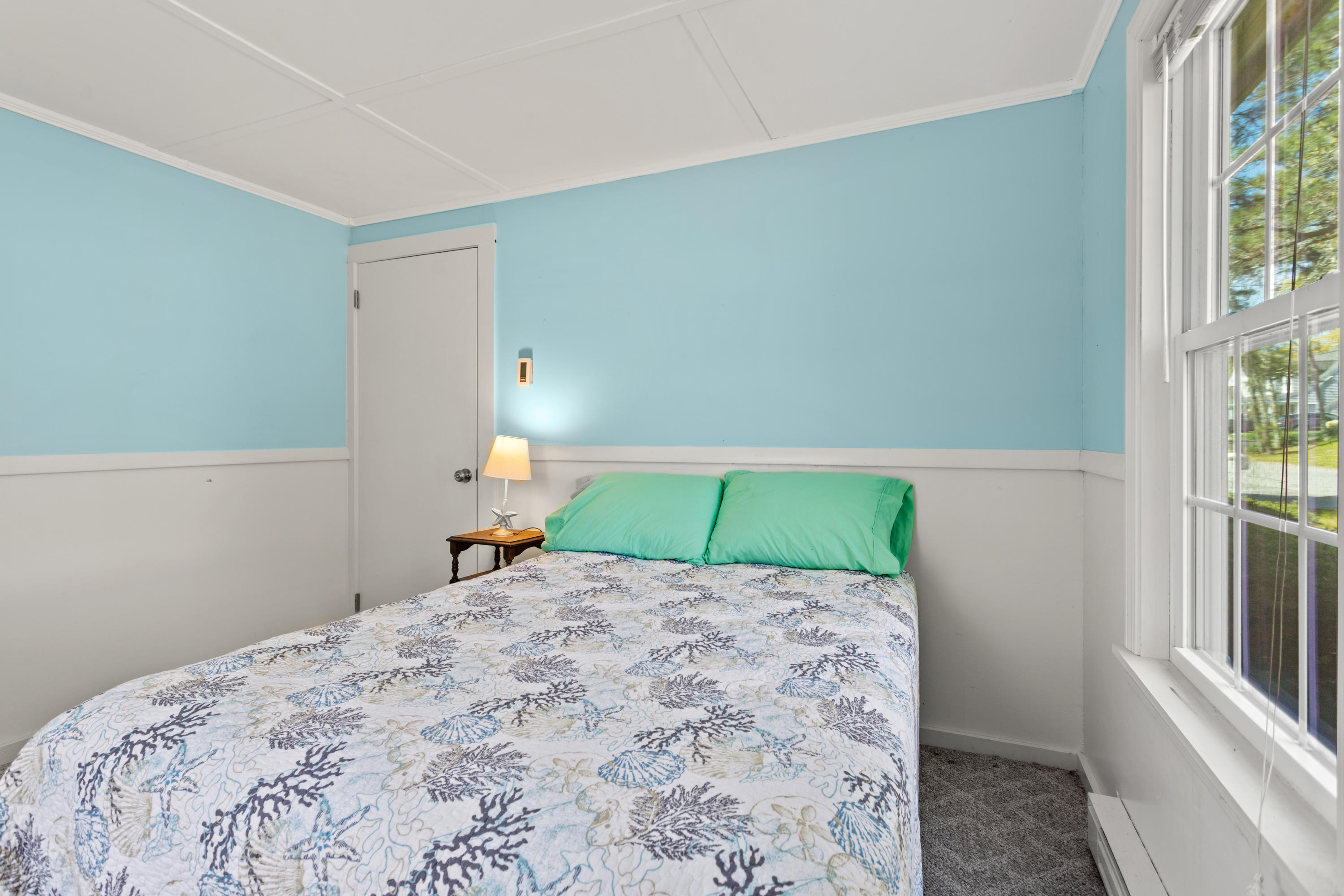 14 Greenwood Road Mashpee, MA 02649 - Photo 16 of 25 a bedroom with a bed and a window