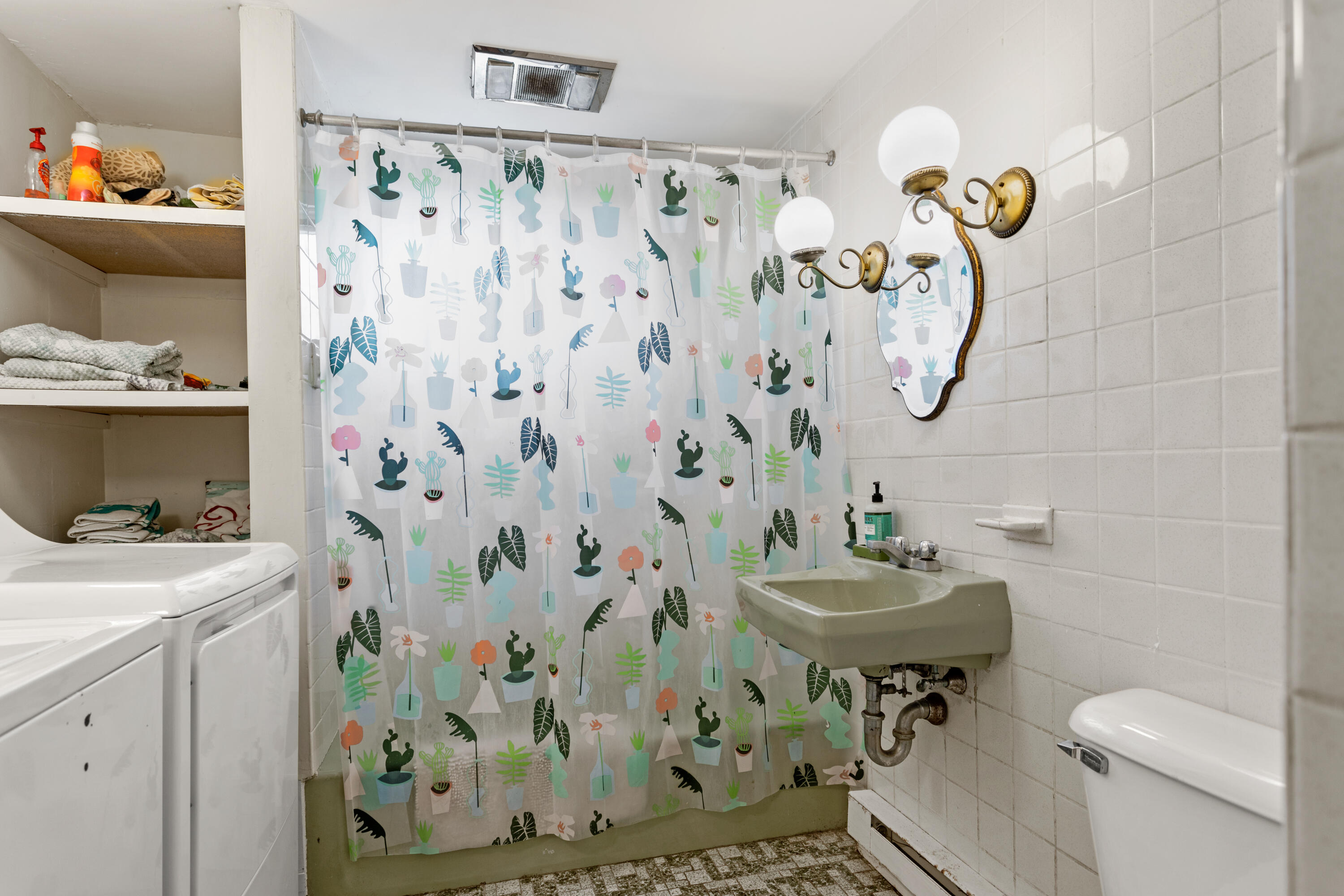 14 Greenwood Road Mashpee, MA 02649 - Photo 17 of 25 a bathroom with a sink toilet and shower curtain