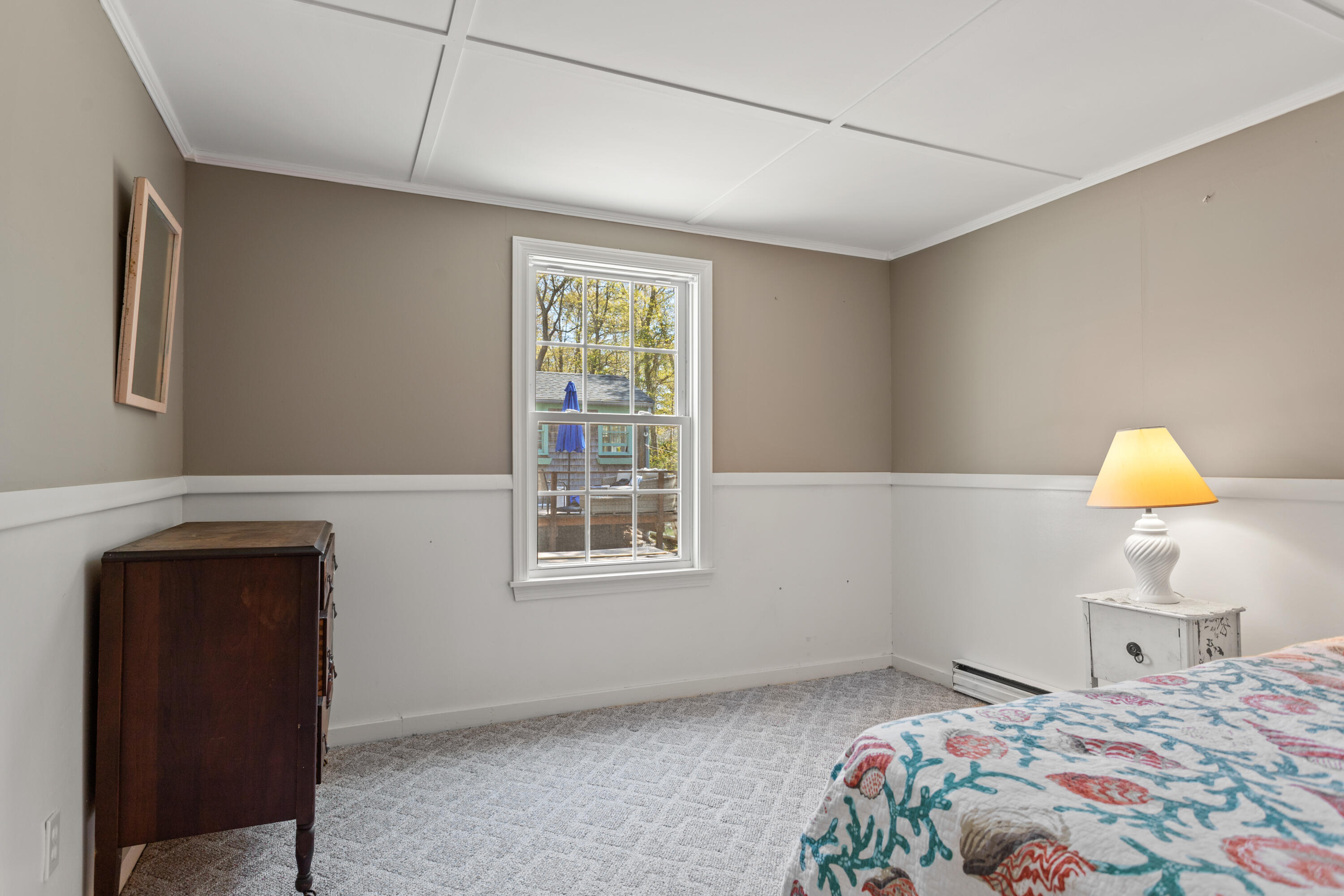 14 Greenwood Road Mashpee, MA 02649 - Photo 18 of 25 a bedroom with a bed and a window