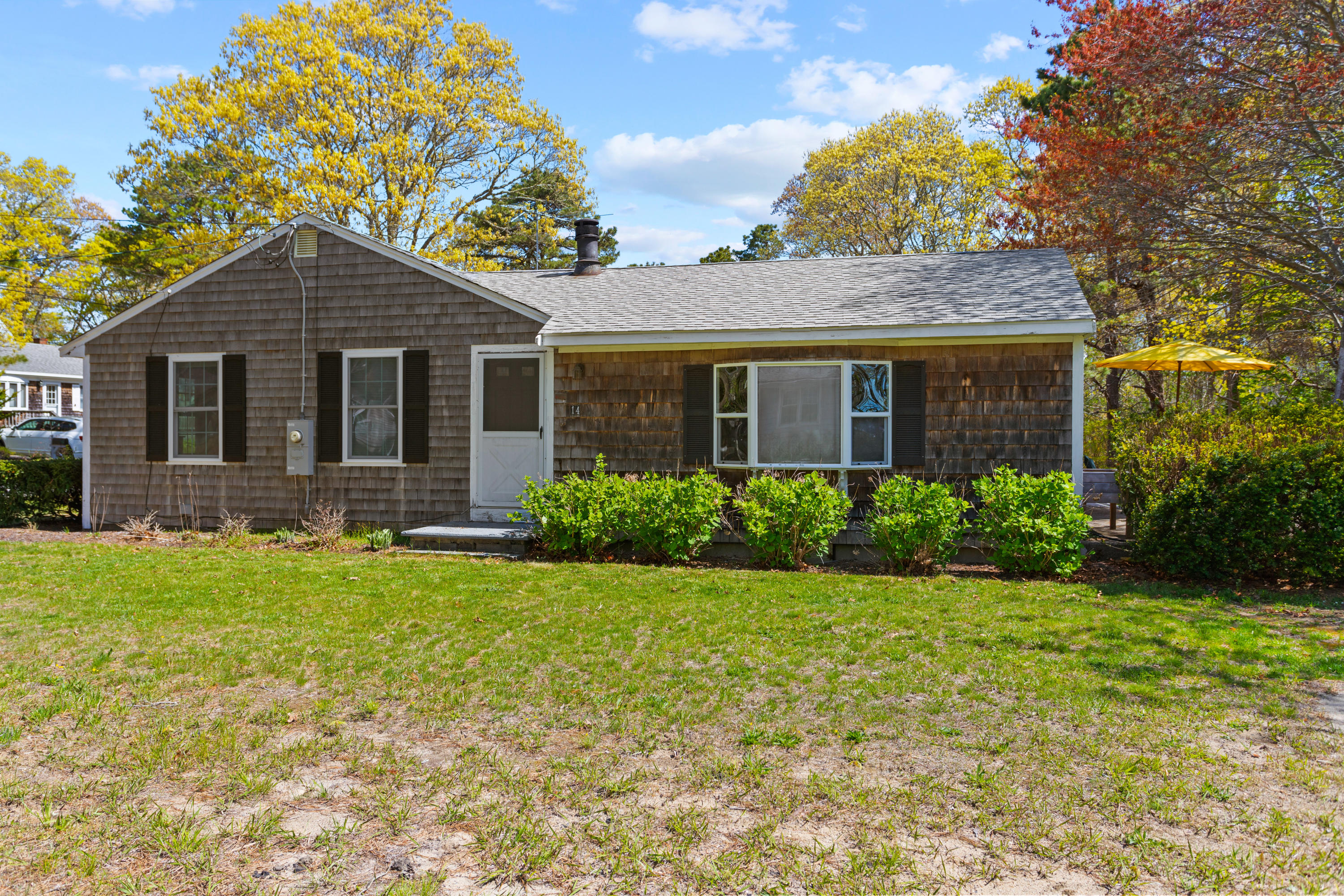 14 Greenwood Road Mashpee, MA 02649 - Photo 24 of 25 a front view of house with yard and green space