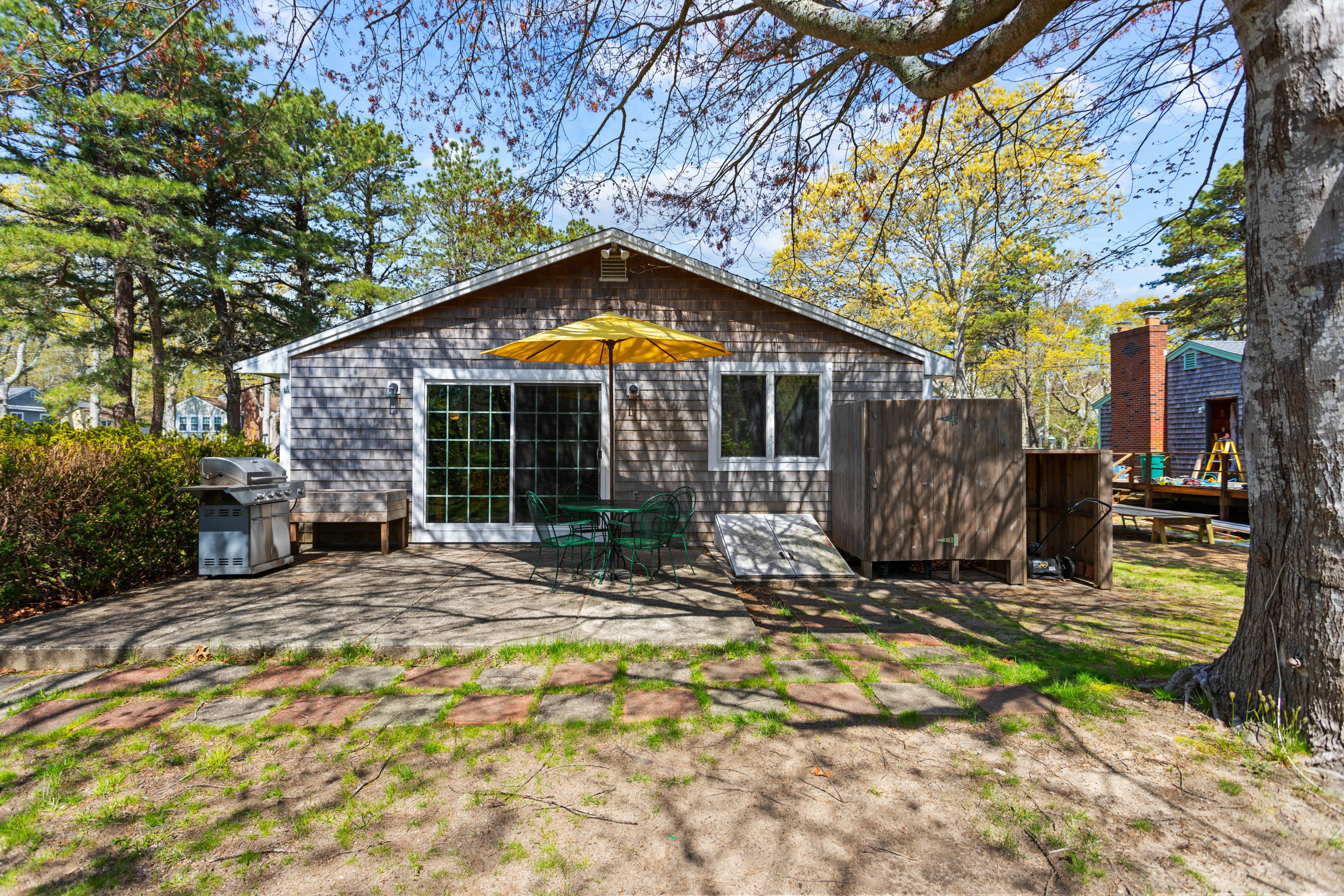 14 Greenwood Road Mashpee, MA 02649 - Photo 7 of 25 a view of house with backyard outdoor seating and yard