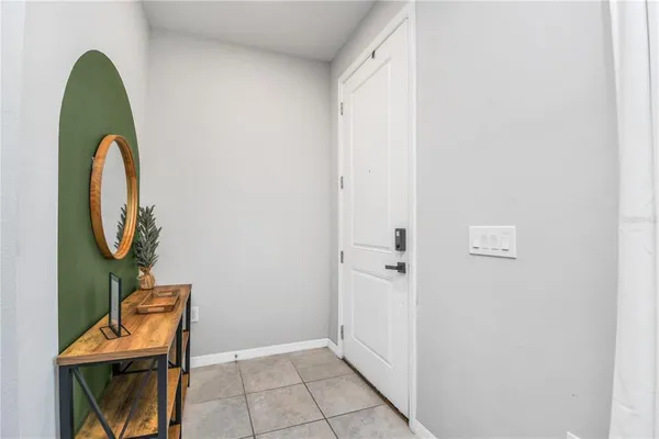 a view of a bathroom with mirror