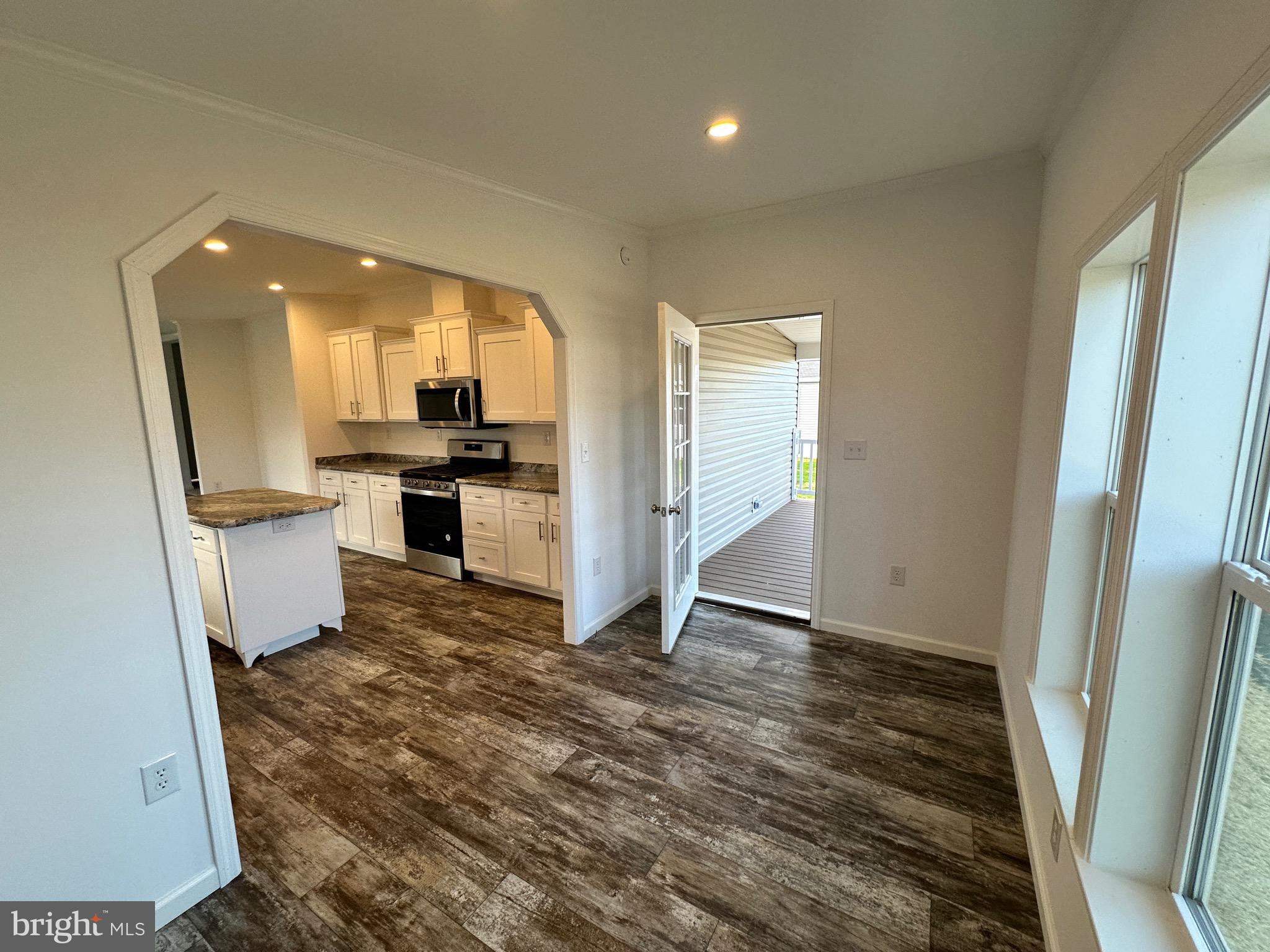 13 Evergreen Alley Palmyra, PA 17078 - Photo 11 of 26 a view of a kitchen with wooden floor and electronic appliances