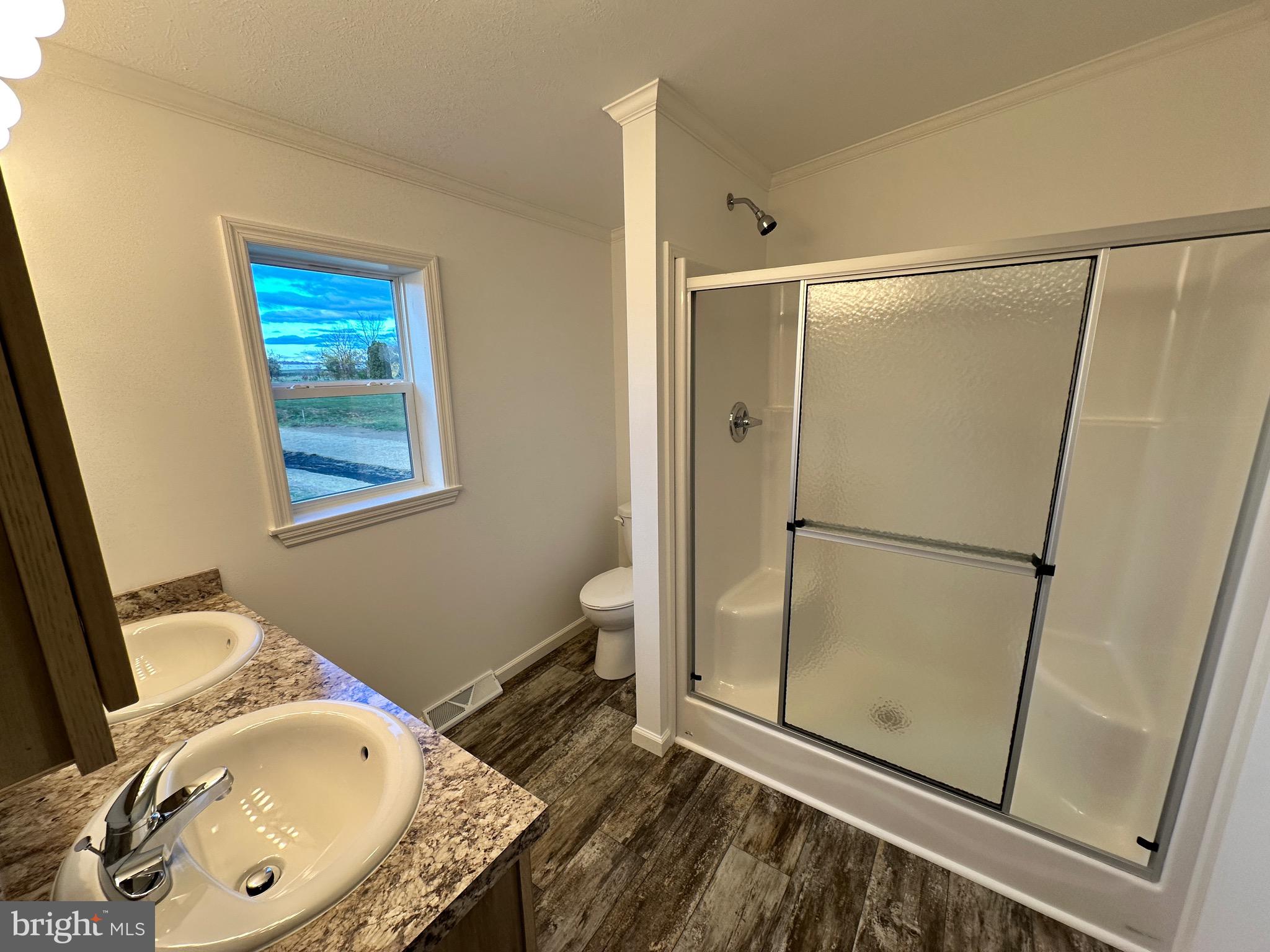 13 Evergreen Alley Palmyra, PA 17078 - Photo 15 of 26 a bathroom with a granite countertop sink toilet and shower