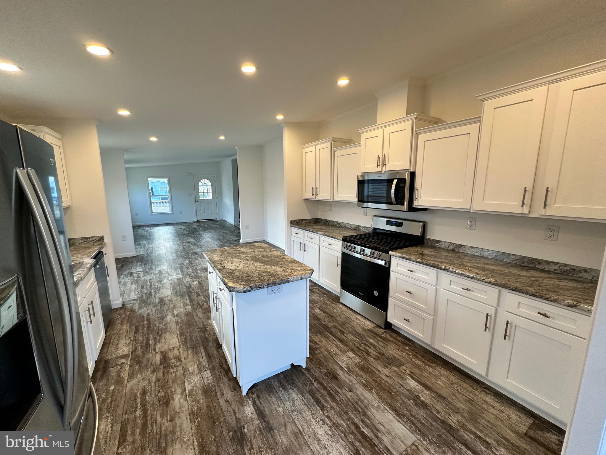 13 Evergreen Alley Palmyra, PA 17078 - Photo 10 of 26 a kitchen with stainless steel appliances granite countertop a stove a sink and a refrigerator