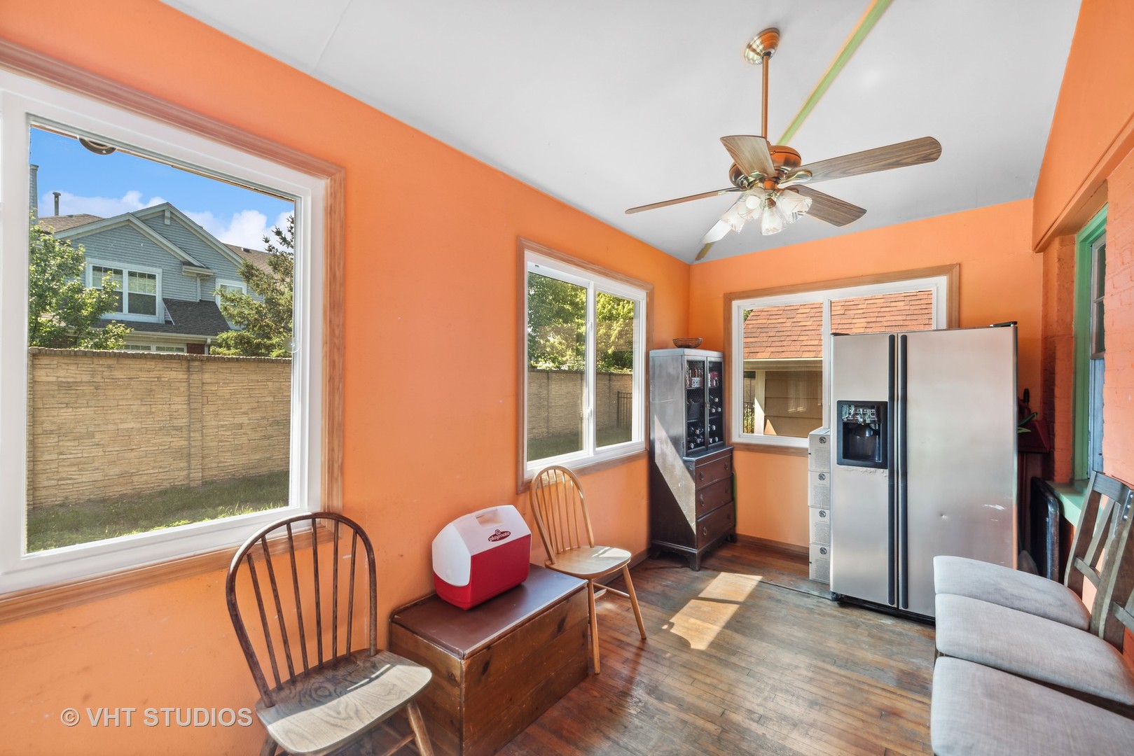 40 Pine Tree Row Lake Zurich, IL 60047 - Photo 15 of 22 a living room with furniture a ceiling fan and a window
