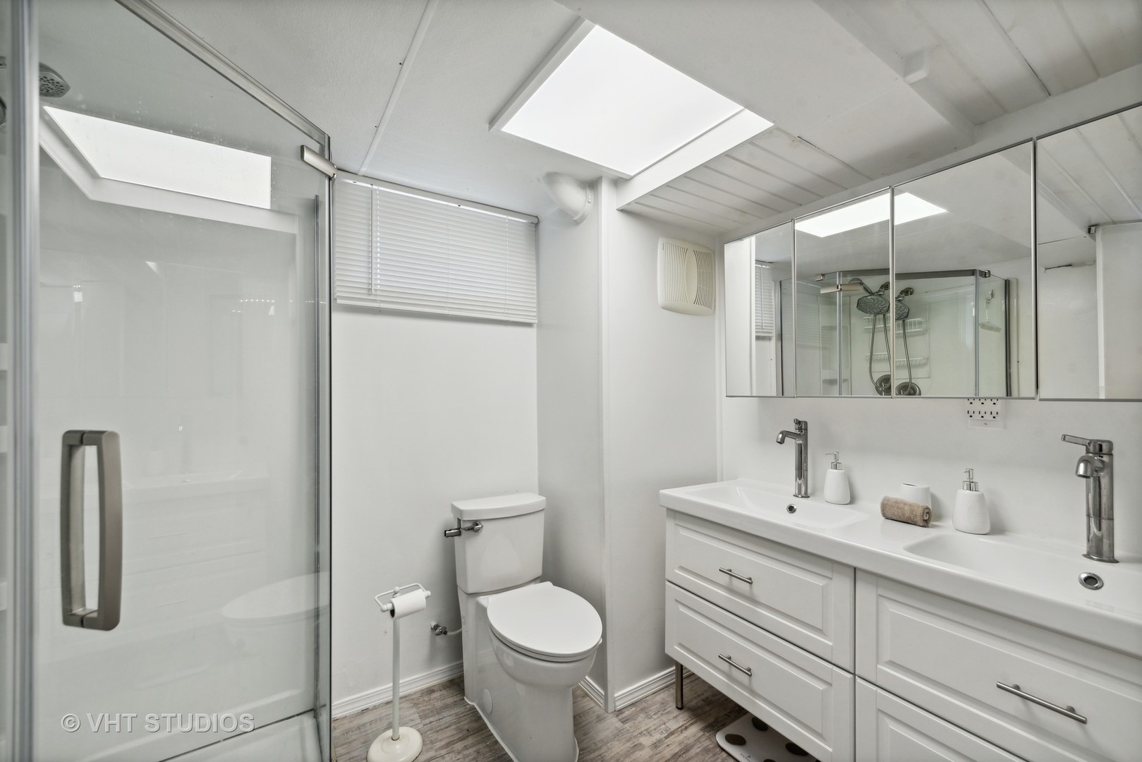 40 Pine Tree Row Lake Zurich, IL 60047 - Photo 18 of 22 a bathroom with a toilet sink and shower